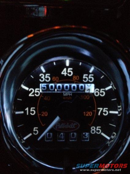 Peterbilt speedometer showing 500,000 miles and 0403 in the odometer