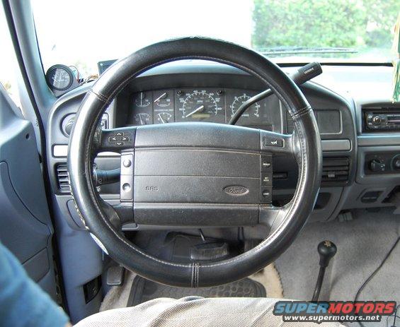 1994 Ford Bronco interior with steering wheel and dashboard gauges