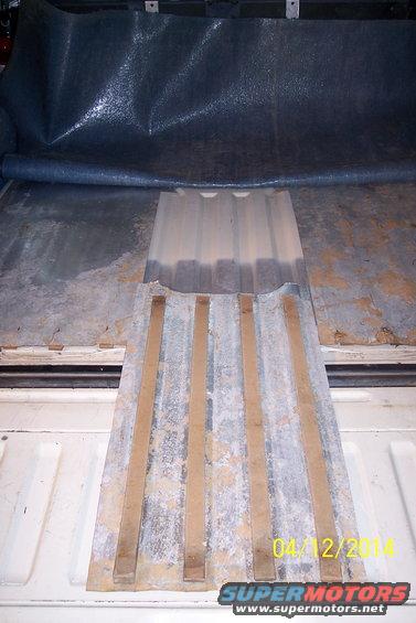 Fuel floor access panel with wooden slats
