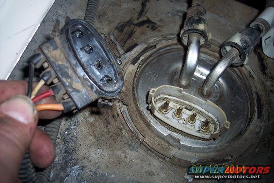 Fuel pump electrical connector and fuel lines disconnected from fuel tank