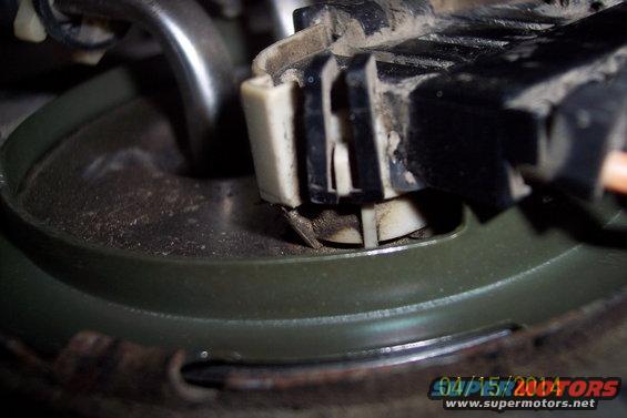 Fuel pump electrical connector with green seal