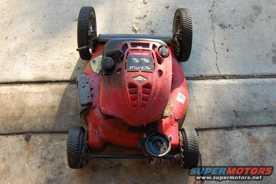 Red Troy-Bilt lawn mower with 21" cut/6.75 HP engine