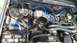 Engine with recently replaced vac lines. Old and brittle plastic lines were replaced with quality si...