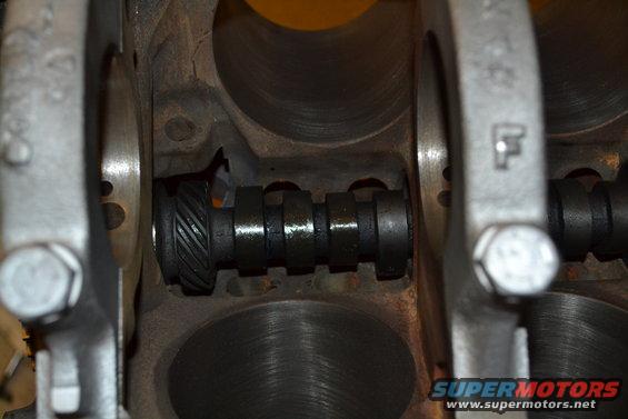 Close-up of an engine's camshaft and cylinder walls