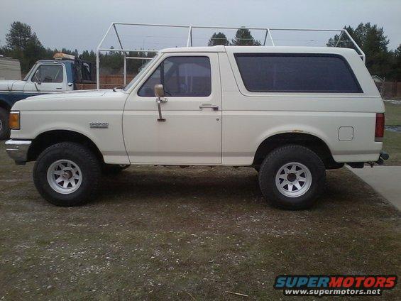 White 1990 Ford Bronco side view