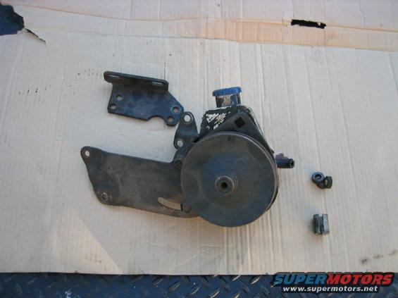 Power steering pump assembly with mounting brackets and hardware