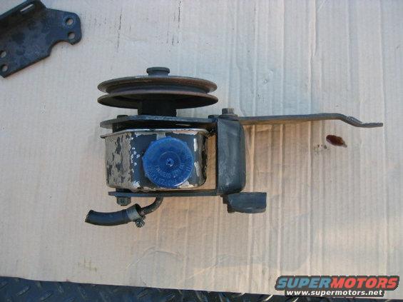 Power steering pump assembly with pulley and bracket, blue cap visible