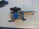 1973 Ford F-100 - Power steering pump assembly with pulley and bracket. Blue cap is visible on the reservoir.