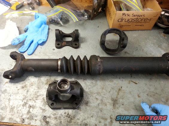 20140420_1419101.jpg The driveshaft is completely shot, in addition to the slip shaft being toast, the cup where the centering ball rides was totally worn out..the drive line shop wanted $400 bucks to rebuild it..ordered a new unit from Bronco Graveyard for $250.