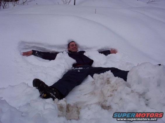 293.jpg Brandon making a snowangel.