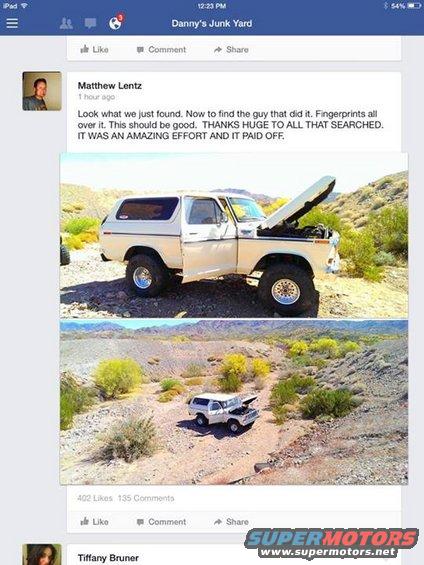 White Ford Bronco with hood open, parked on a dirt road in a desert landscape