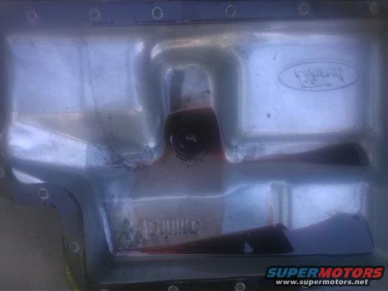 Ford oil pan with dark fluid