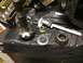 1996 Ford Bronco - Various automotive differential components are laid out on a black surface, with a digital caliper present.
