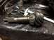 1996 Ford Bronco - A differential gear and axle shaft are shown with measuring tools, suggesting a repair or parts identification.
