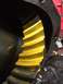 1996 Ford Bronco - Close-up of a differential gear showing yellow marking compound applied to the teeth.