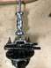 1996 Ford Bronco - A slide hammer is used with a bearing puller to remove a component from a vehicle differential.