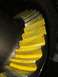 1996 Ford Bronco - Close-up of a differential gear with yellow paint on its teeth.