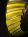 1996 Ford Bronco - This differential gear shows wear patterns on its teeth, indicated by the yellow coating.