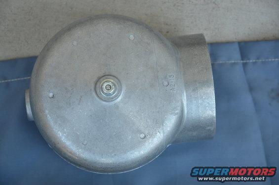 metal part with pipe fittings, has 'C A2-15' marking