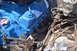 1981 Ford F-250 - Engine bay detail showing a blue Ford V8 engine with visible exhaust and wiring harnesses.
