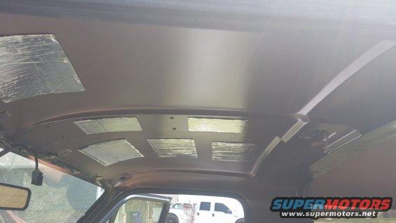 Interior ceiling of a vehicle with soundproofing material applied