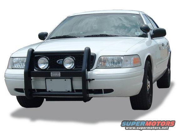 Front view of a white 2004 Ford Crown Victoria police car with a black push bar and spotlights