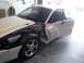 1996 Ford Mustang - This 1996 Ford Mustang coupe shows significant damage to its front fender and driver's side door.