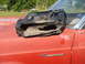 1998 Honda Shadow VT750C - A damaged leather saddlebag sits on the hood of a red car, with 'Ranchero' badging visible.