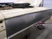 1964 Ford Galaxie - The side panel of a 1964 Ford Galaxie is shown undergoing repair, with visible welding marks.