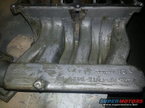 Engine intake manifold with part number RF-FOTE-9425-BA