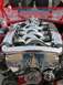 1993 Ford Taurus - A highly polished Yamaha SHO engine is the centerpiece of this custom build, intricate intake runners and a prominent Yamaha logo.