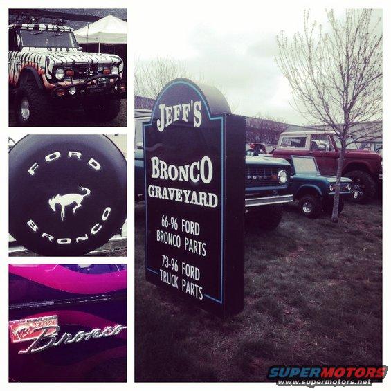 Sign for Jeff's Bronco Graveyard, showing 66-96 Ford Bronco parts and 73-96 Ford truck parts. Several Broncos are parked nearby