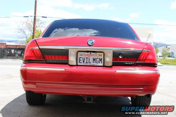 Red 2002 Mercury Grand Marquis rear view with California license plate EVIL MGM