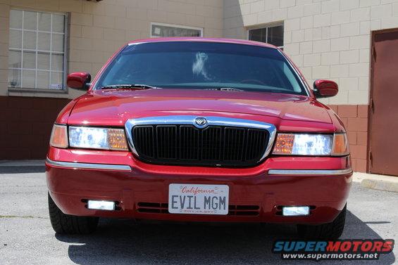 Red 2002 Mercury Grand Marquis front view with California license plate EVIL MGM