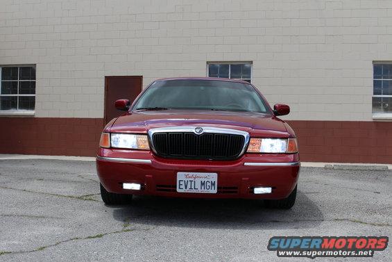 Red 2002 Mercury Grand Marquis front view with California license plate EVIL MGM