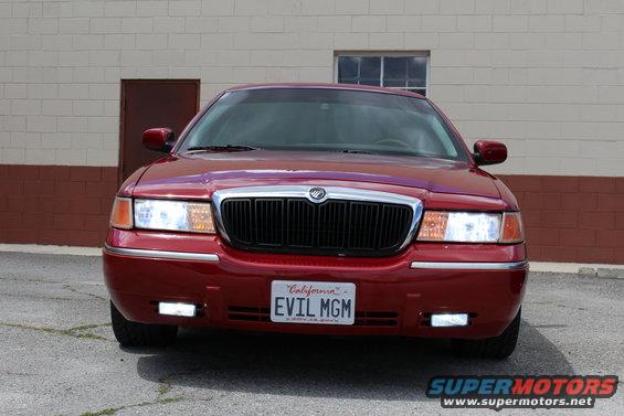 Red 2002 Mercury Grand Marquis front view with "EVIL MGM" license plate