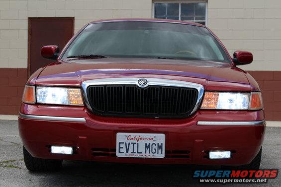 Red 2002 Mercury Grand Marquis front view with California license plate EVIL MGM