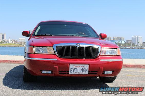 Red 2002 Mercury Grand Marquis front view with California license plate EVIL MGM