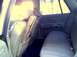 1987 Ford Crown Victoria LTD - Interior view of a 1987 Ford Crown Victoria LTD, showing the seats and door panel.