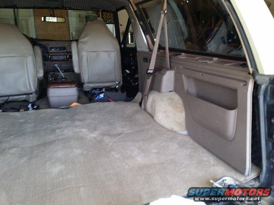 Interior view of a 1994 Ford Bronco showing front seats and cargo area