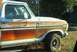 1979 Ford Bronco - The side panel of a 1978 Ford Bronco shows its distinctive woodgrain trim and chrome accents.