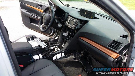 2014 Subaru Outback interior with dashboard disassembled and wiring exposed