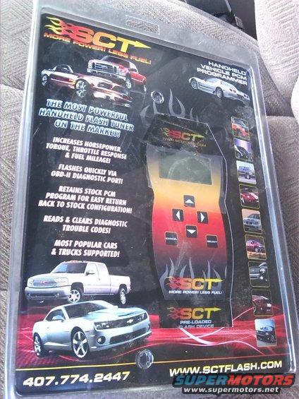 Packaging for an SCT handheld flash tuner showing images of various cars and trucks, including a Ford F-150, a Chevrolet Camaro, and a GMC pickup