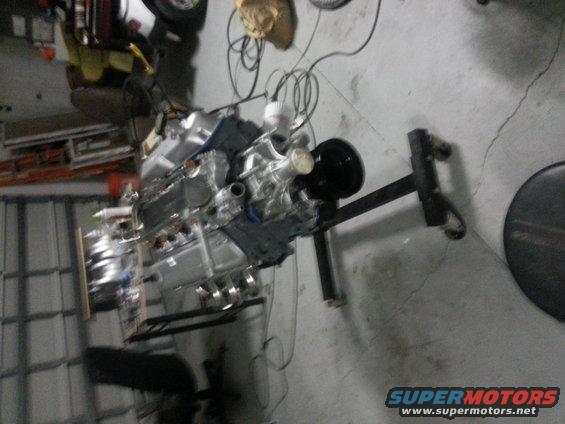 Engine on stand, silver and black