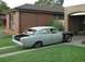 1970 Ford Falcon - This 1970 Ford Falcon is undergoing restoration, with its front end disassembled and trunk open.