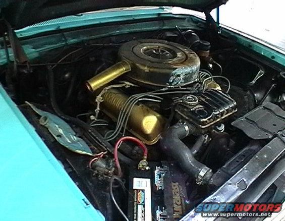 1964 Mercury Monterey engine bay with V8 engine, air cleaner, and battery