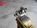 1992 Ford Bronco - A flaring tool is secured in a vise, preparing to shape metal tubing.