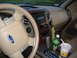 2007 Ford F-150 - Interior view of a 2007 Ford F-150, the steering wheel, dashboard, and center console.