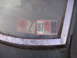 2007 Ford F-150 - Close-up of windshield stickers, one reading '87' and another '10'.