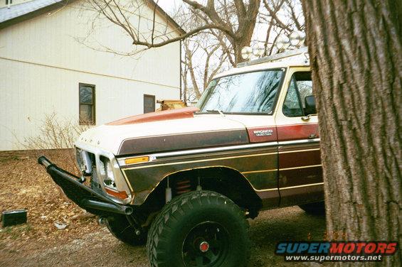 1979 Ford Bronco with custom front bumper and lifted suspension